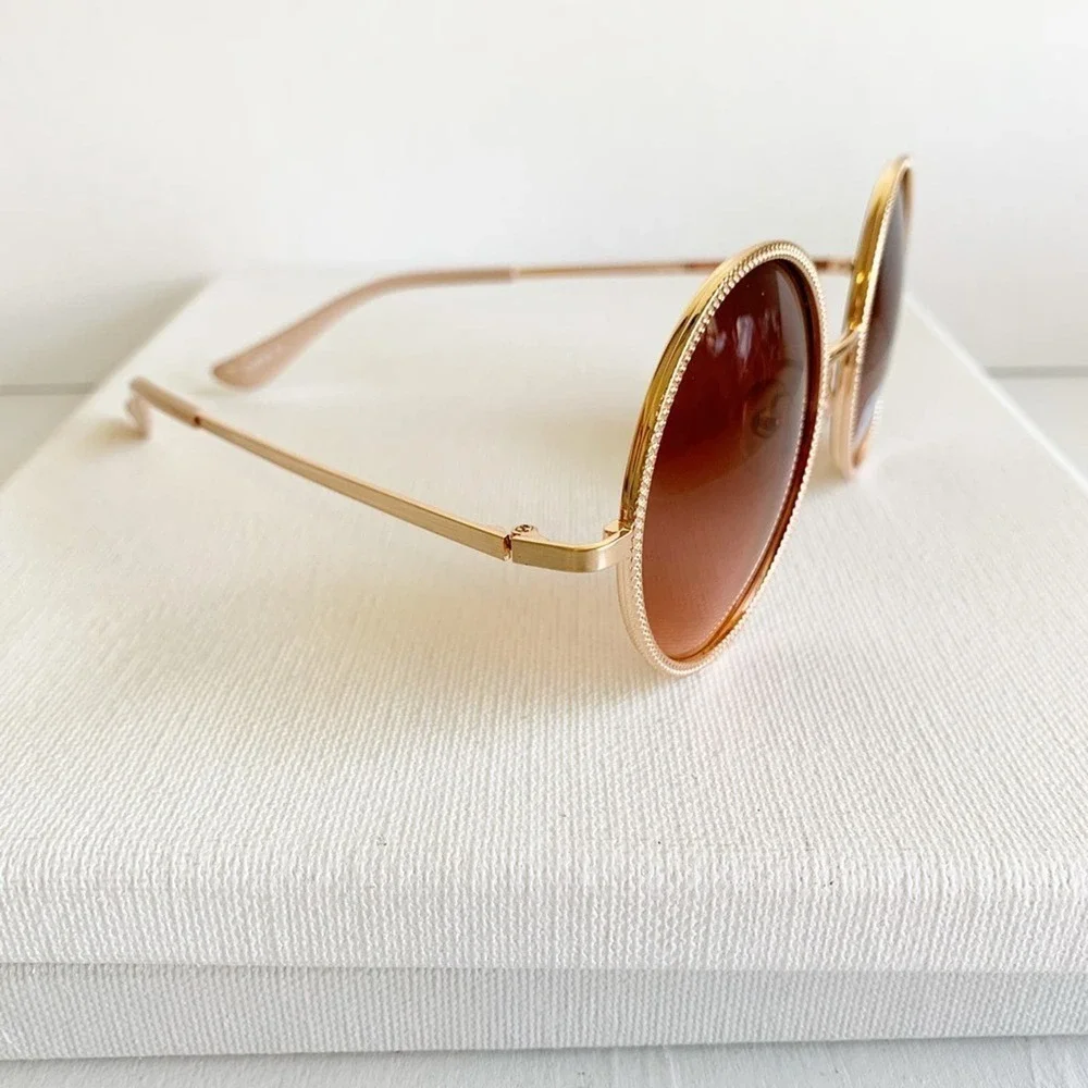 New with tage FGX rose gold round sunglasses